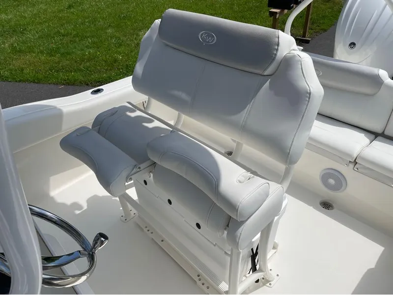 Slide: The Image of 2024 Key West 219 FS boat seating and steering wheel. - 9
