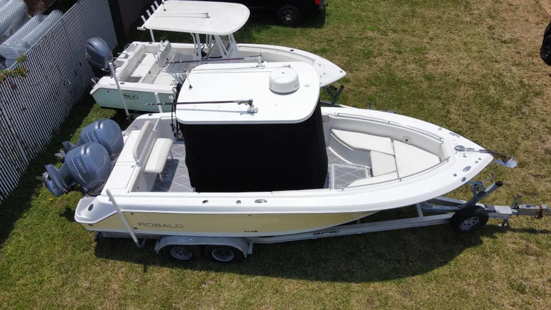 Slide: The Image of 2006 Robalo R260 Center Console boat on a trailer, aerial view. - 13