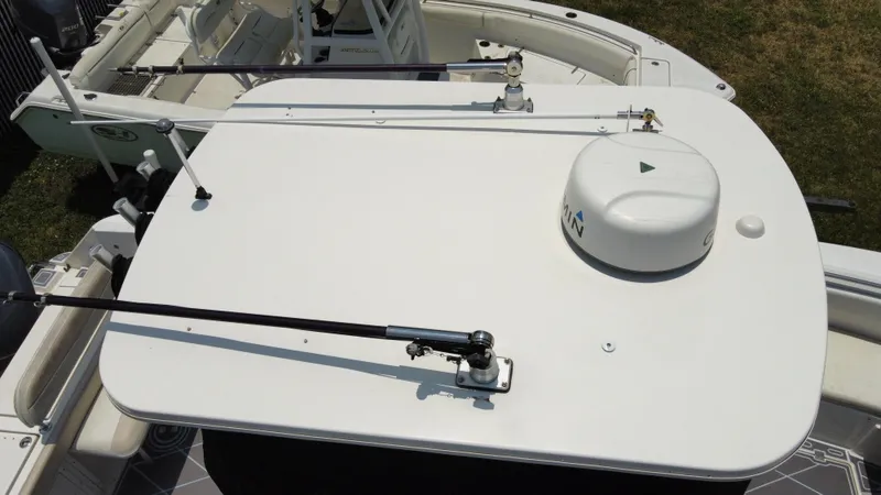 Slide: The Image of 2006 Robalo R260 Center Console boat with radar and antennas. - 17