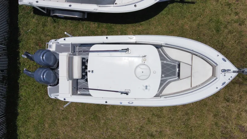 Slide: The Image of 2006 Robalo R260 Center Console boat with twin outboard engines, aerial view. - 20