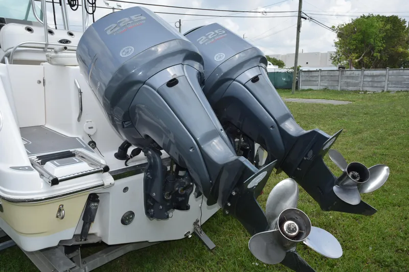 Slide: The Image of 2006 Robalo R260 Center Console with twin 225 HP outboard motors. - 23