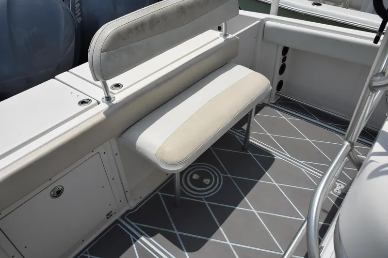 Slide: The Image of 2006 Robalo R260 Center Console boat interior seating and deck. - 41