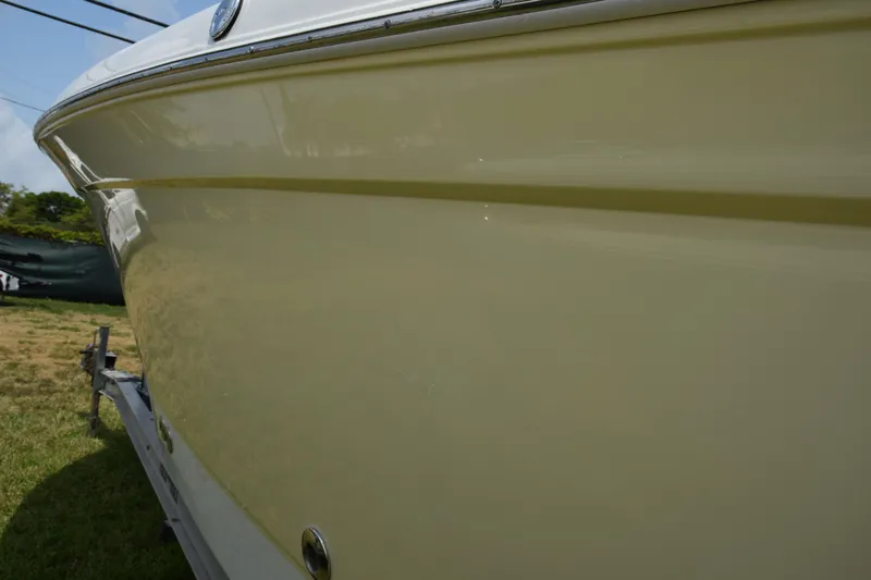 Slide: The Image of Close-up of a 2006 Robalo R260 Center Console boat hull. - 7