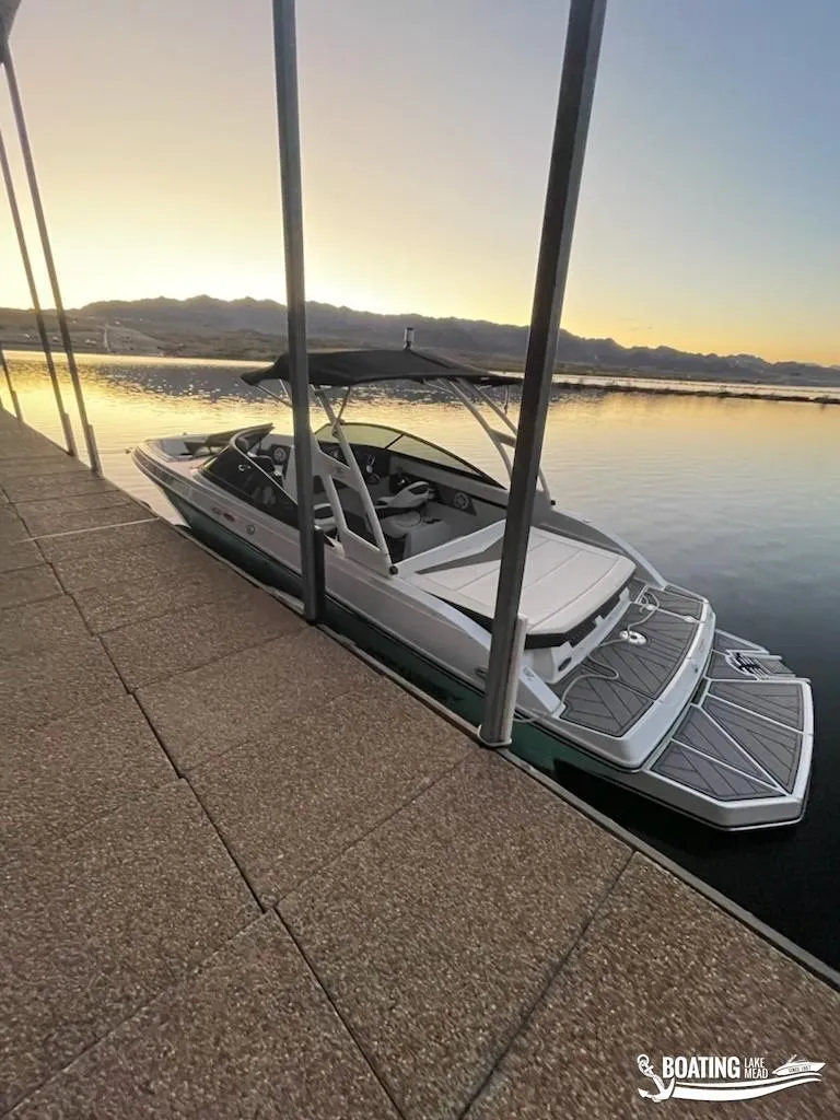 Slide: The Image of 2023 Monterey M22 boat docked at sunset on Lake Mead. - 19