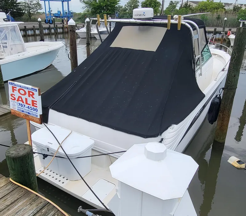 Slide: The Image of 1993 Sea Ray Laguna 29 Walkaround boat for sale at dock. - 18
