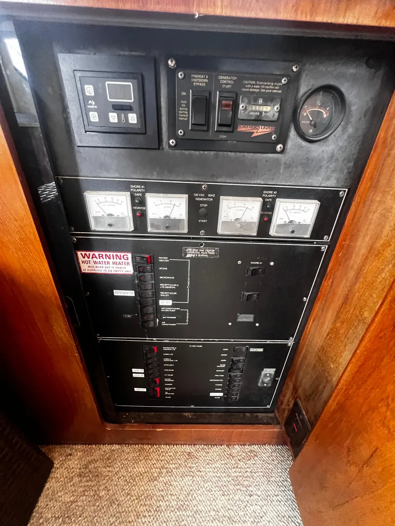 Slide: The Image of Electrical control panel of a 1993 Carver 350 Aft Cabin boat. - 21