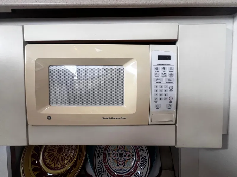Slide: The Image of Built-in microwave in 1993 Carver 350 Aft Cabin yacht kitchen. - 32