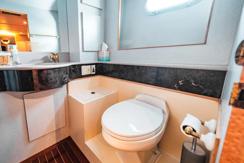 Slide: The Image of Bathroom interior of 1992 Monte Fino 94 Motor Yacht with modern fixtures. - 16