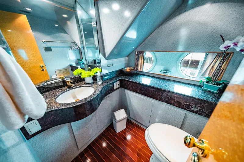 Slide: The Image of Luxurious bathroom in a 1992 Monte Fino 94 Motor Yacht with modern amenities. - 21