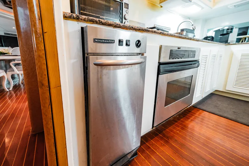 Slide: The Image of Modern kitchen appliances on a 1992 Monte Fino 94 Motor Yacht. - 25