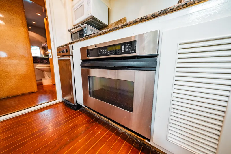Slide: The Image of Modern kitchen appliances in the 1992 Monte Fino 94 Motor Yacht. - 26