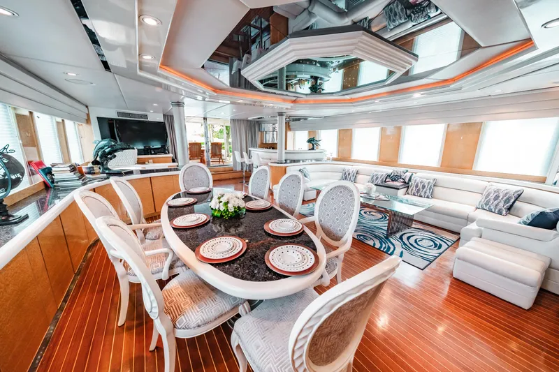 Slide: The Image of Luxurious interior of a 1992 Monte Fino 94 Motor Yacht with elegant dining and seating areas. - 29
