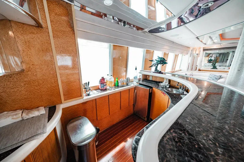 Slide: The Image of Luxurious kitchen area in a 1992 Monte Fino 94 Motor Yacht with modern amenities. - 31