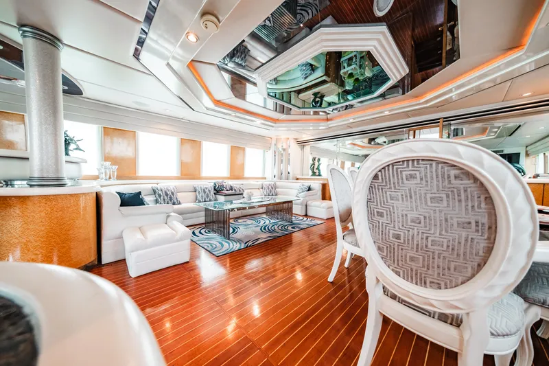 Slide: The Image of Luxurious interior of 1992 Monte Fino 94 Motor Yacht with elegant seating and wooden flooring. - 36