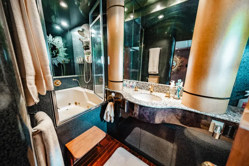 Slide: The Image of Luxurious bathroom in 1992 Monte Fino 94 Motor Yacht with jacuzzi and modern fixtures. - 42