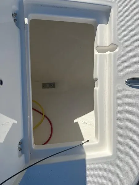 Slide: The Image of Storage compartment of a 2023 Sea Born LX24 Center Console LE boat. - 4