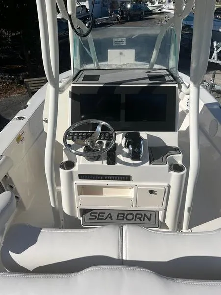 Slide: The Image of 2023 Sea Born LX24 Center Console LE boat dashboard and controls. - 7