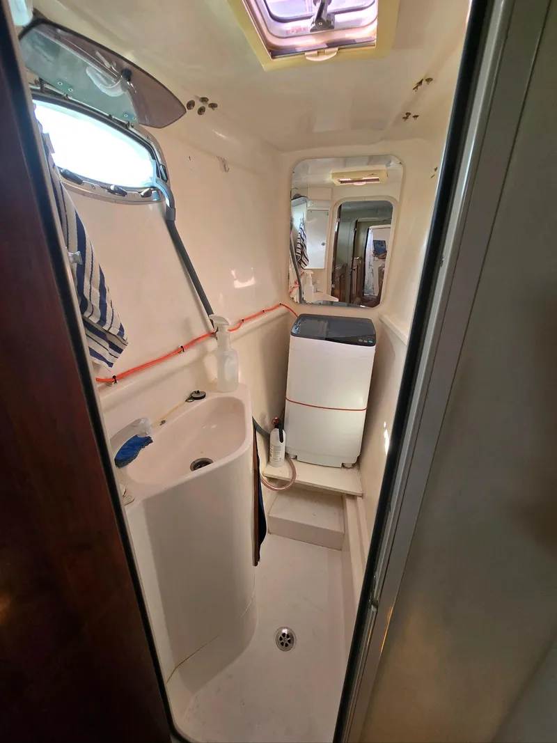 Slide: The Image of 2009 Fusion 40 yacht bathroom with compact design and modern fixtures. - 13