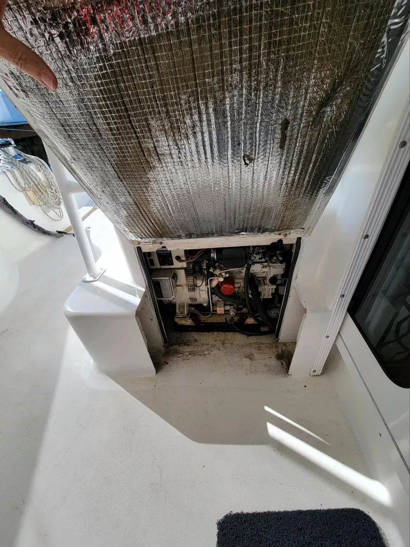 Slide: The Image of 2009 Fusion 40 engine compartment with insulation panel partially removed. - 31