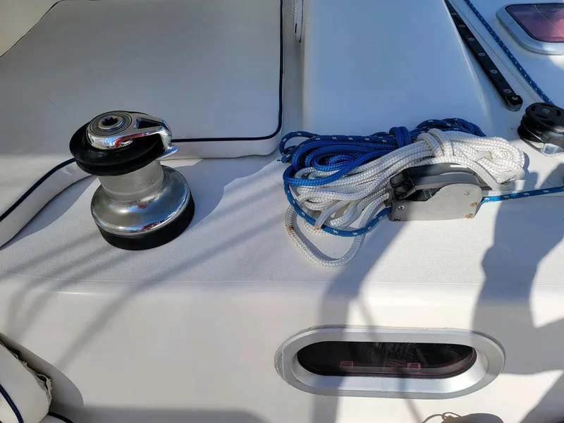 Slide: The Image of Sailing equipment on 2009 Fusion 40 yacht deck with winch and coiled rope. - 34