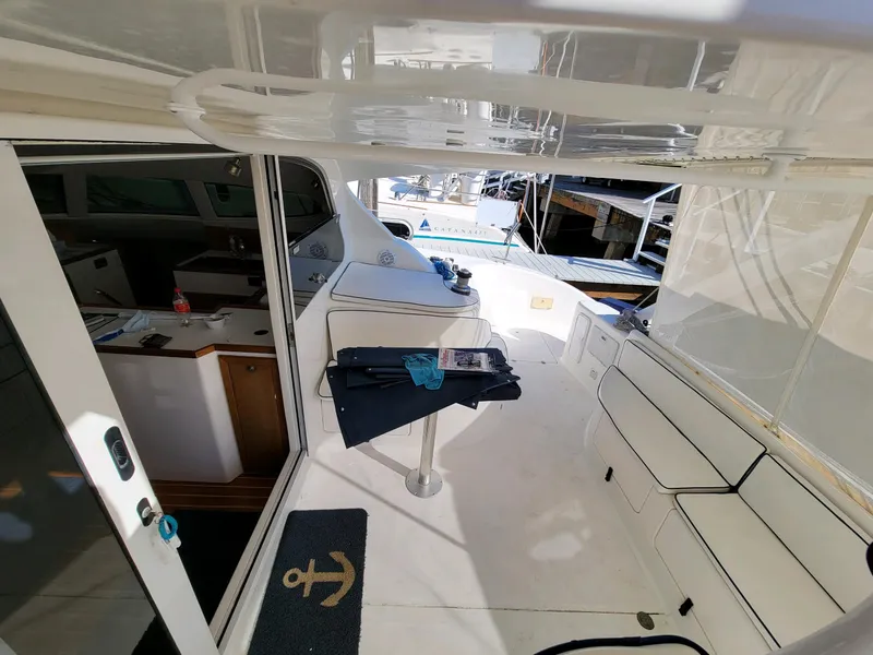 Slide: The Image of Interior view of 2009 Fusion 40 yacht with seating and table. - 37