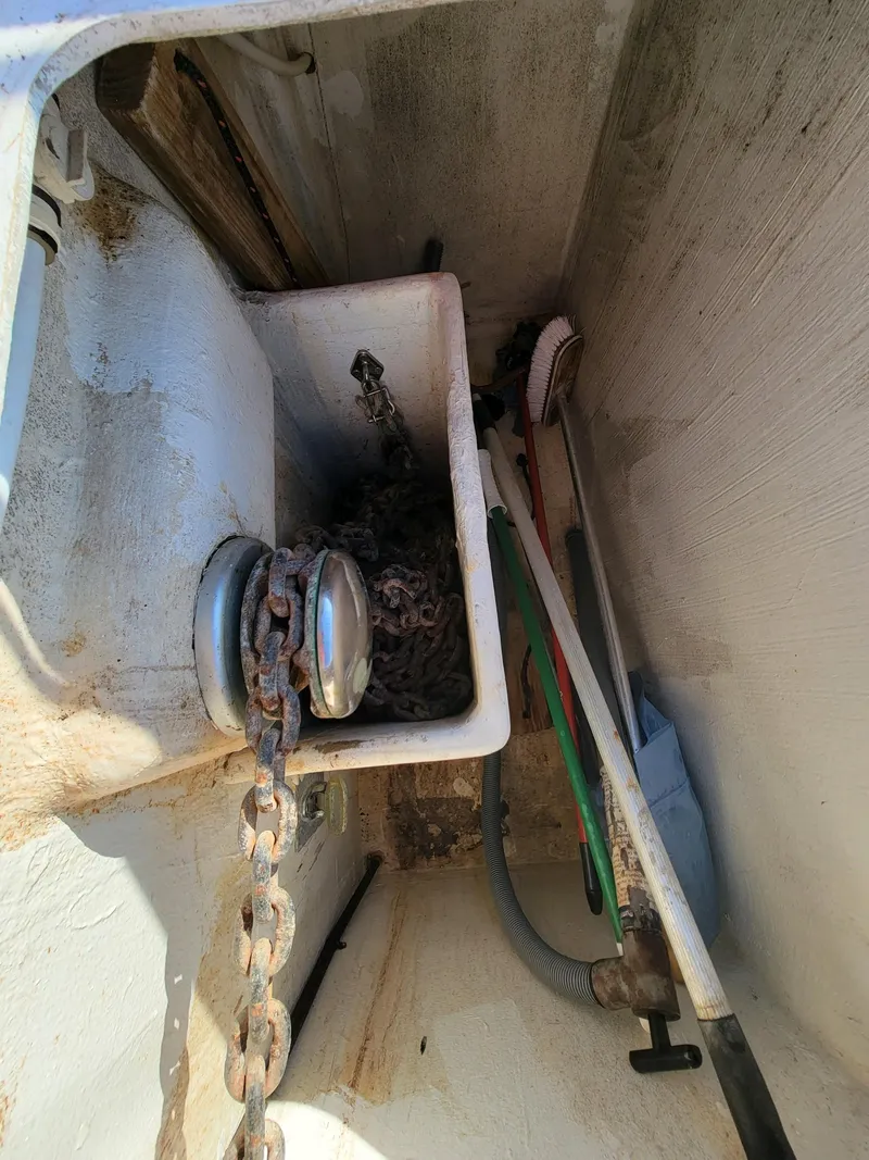 Slide: The Image of Anchor chain storage in 2009 Fusion 40 boat compartment. - 41