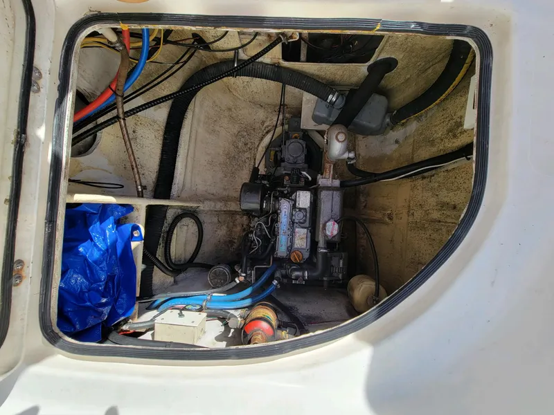 Slide: The Image of Engine compartment of a 2009 Fusion 40 boat, showing wiring and mechanical components. - 42