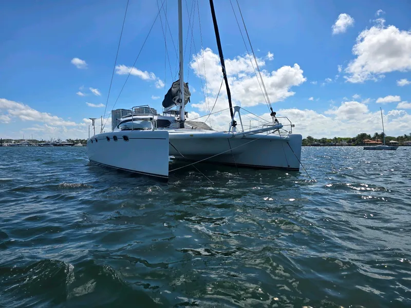 Slide: The Image of 2009 Fusion 40 catamaran sailing on a sunny day with blue skies. - 5