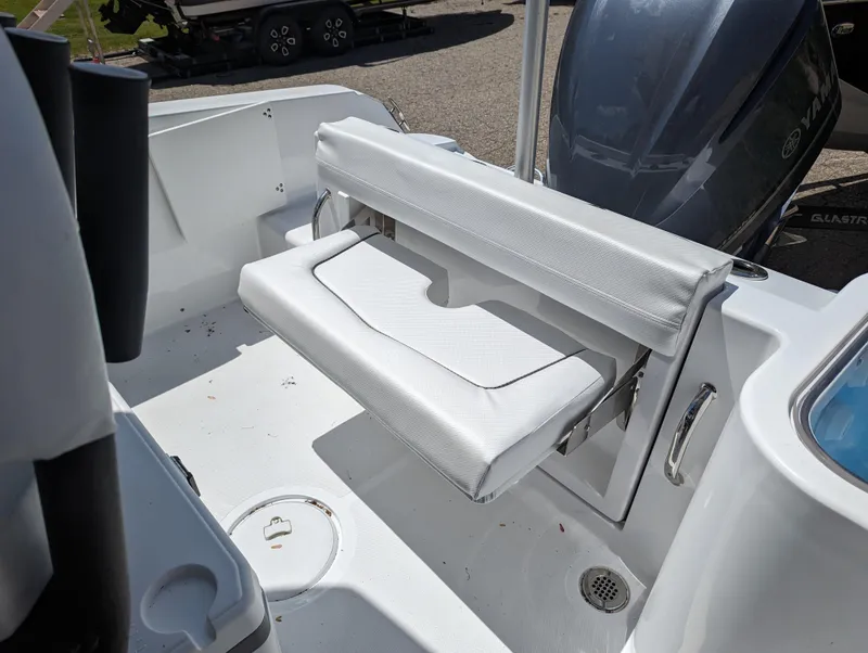 Slide: The Image of 2024 Wellcraft 223 Fisherman boat interior with foldable seating. - 11