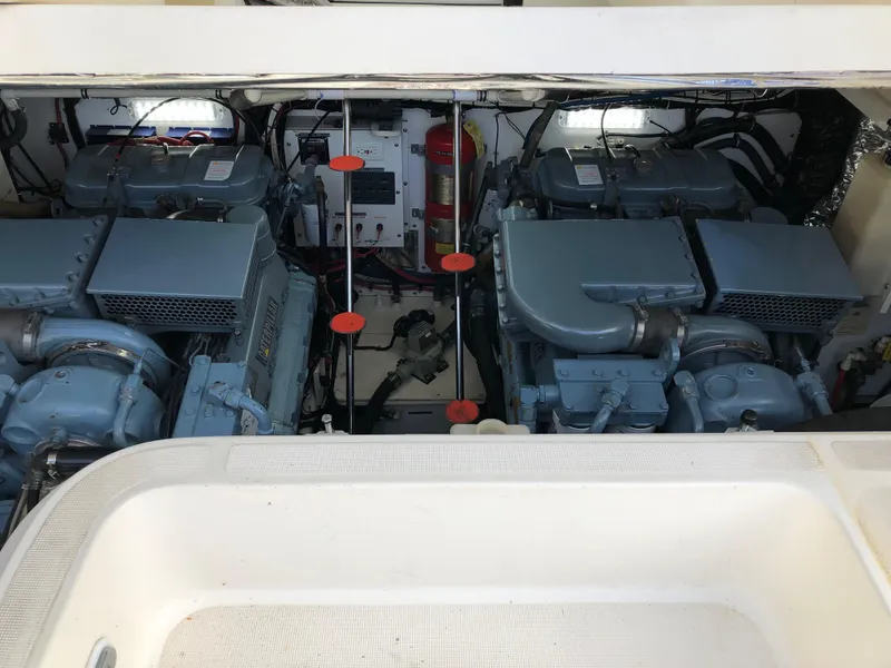 Slide: The Image of 1997 Tiara Yachts 3700 Open engine compartment with dual engines. - 9