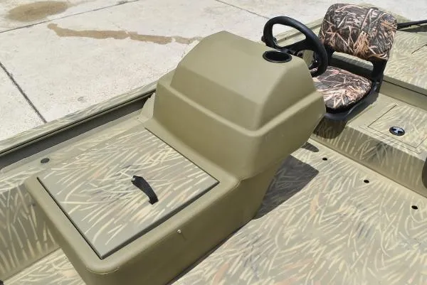 Slide: The Image of 2024 Tracker Grizzly 1754 SC boat console and camo seat. - 22