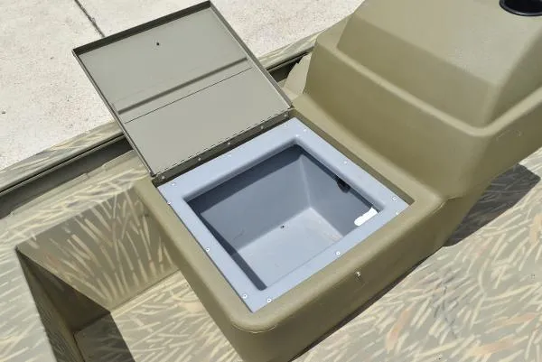 Slide: The Image of 2024 Tracker Grizzly 1754 SC storage compartment with open lid. - 8
