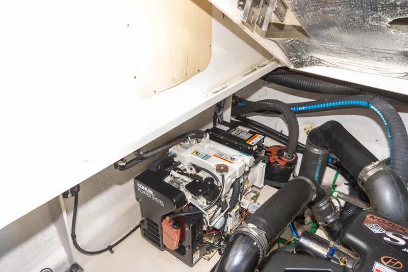 Slide: The Image of Engine compartment of a 2005 Sea Ray 340 Sundancer boat. - 30