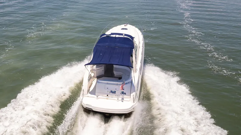 Slide: The Image of 2005 Sea Ray 340 Sundancer cruising on open water. - 4