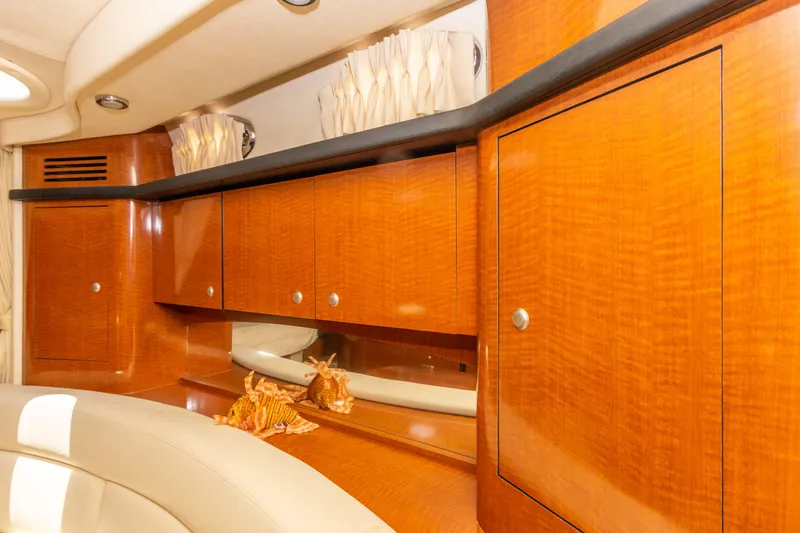 Slide: The Image of Luxurious wooden cabinetry in 2005 Sea Ray 340 Sundancer yacht interior. - 46
