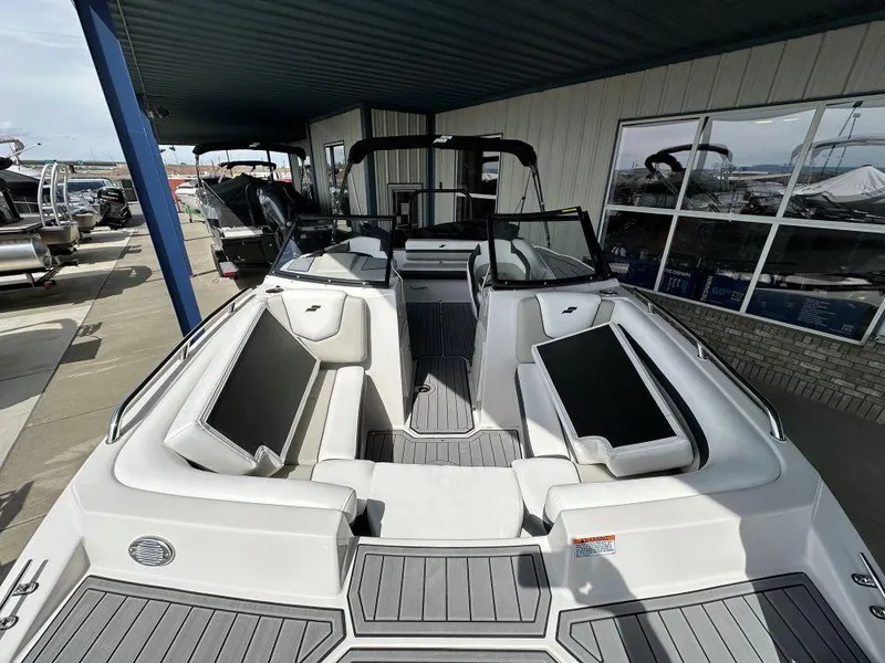 Slide: The Image of 2024 Starcraft SVX 210 OB DC boat with spacious seating and modern design. - 4