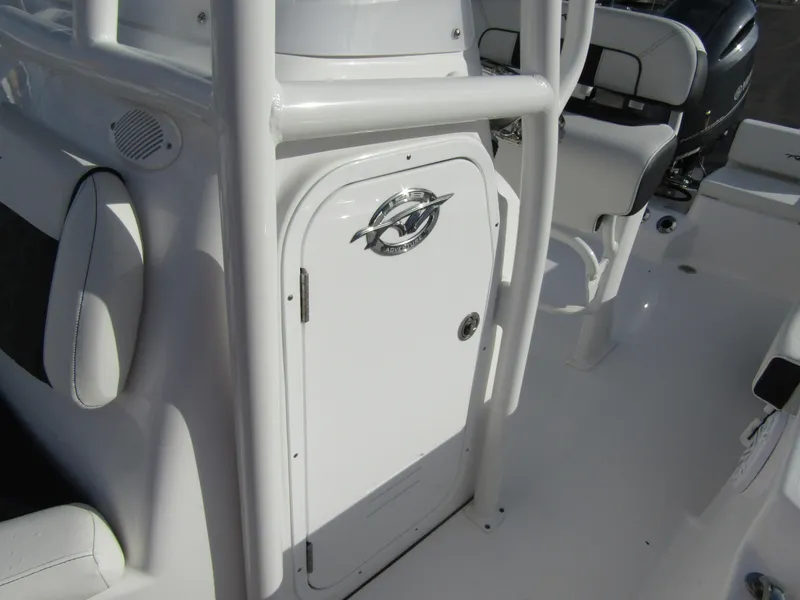 Slide: The Image of 2023 Tidewater 198 CC Adventure boat interior with storage compartment. - 13