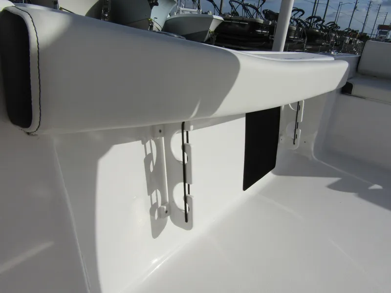 Slide: The Image of 2023 Tidewater 198 CC Adventure boat interior detail with rod holders. - 21