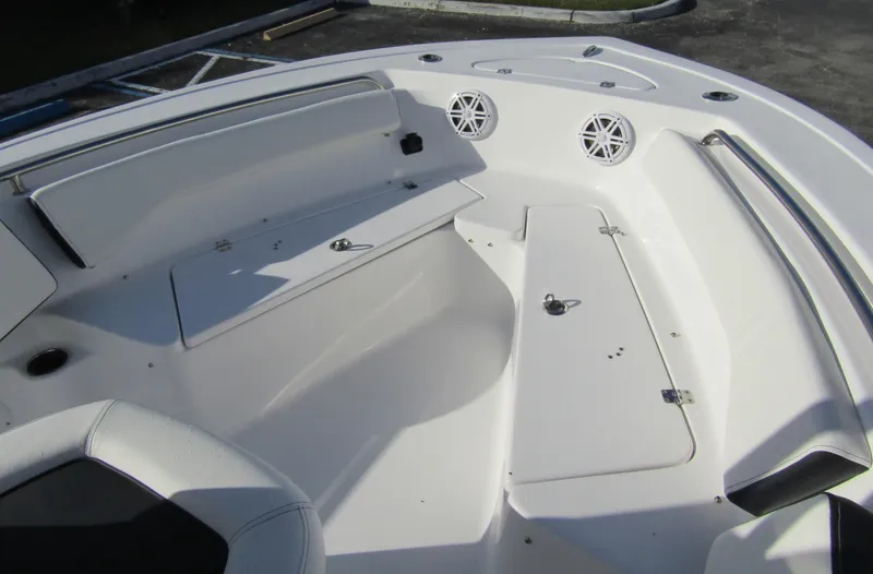 Slide: The Image of 2023 Tidewater 198 CC Adventure boat interior with seating and storage compartments. - 9