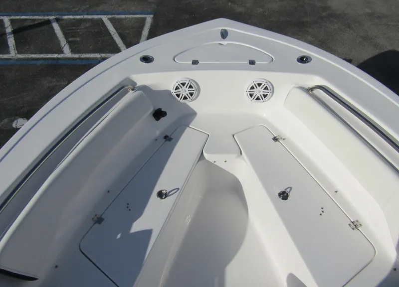 Slide: The Image of 2023 Tidewater 198 CC Adventure boat bow with storage compartments and speakers. - 7