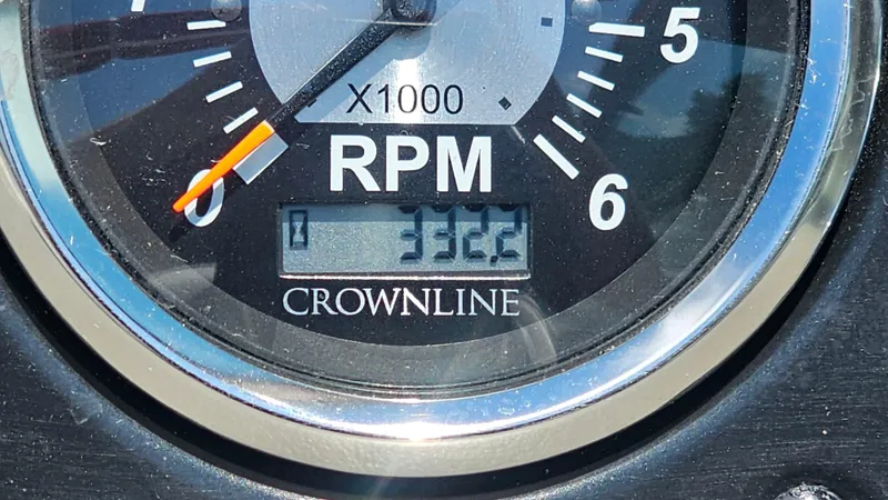 Slide: The Image of Crownline 260 CR 2010 RPM gauge showing 3322 revolutions per minute. - 25
