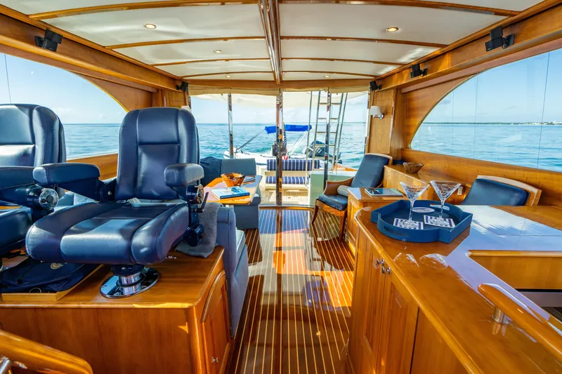 Slide: The Image of Luxurious interior of 2007 Hinckley Talaria 55 FB yacht with elegant seating and ocean view. - 12