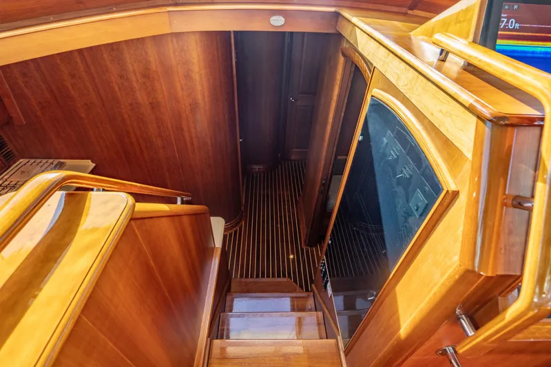 Slide: The Image of Luxurious wooden interior of 2007 Hinckley Talaria 55 FB yacht staircase. - 16