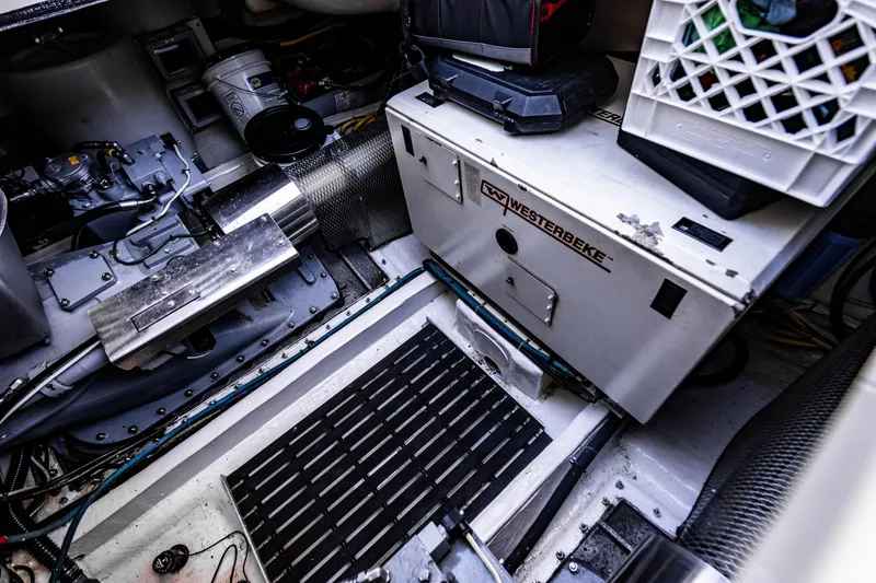 Slide: The Image of Engine room of 2007 Hinckley Talaria 55 FB with Westerbeke generator and mechanical components. - 42