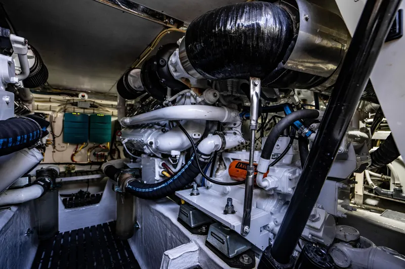 Slide: The Image of Engine room of 2007 Hinckley Talaria 55 FB yacht, showcasing complex machinery and components. - 45