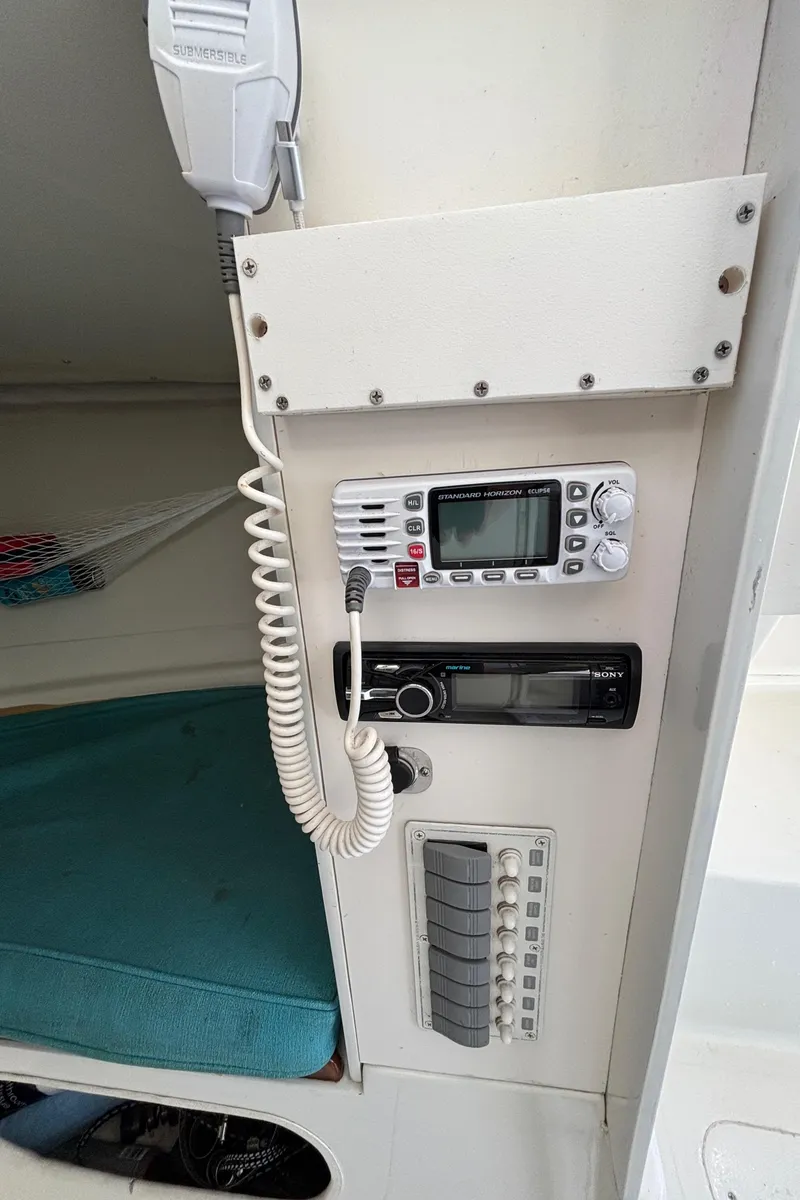 Slide: The Image of 1966 Bertram 25 boat interior with radio and control panel. - 7