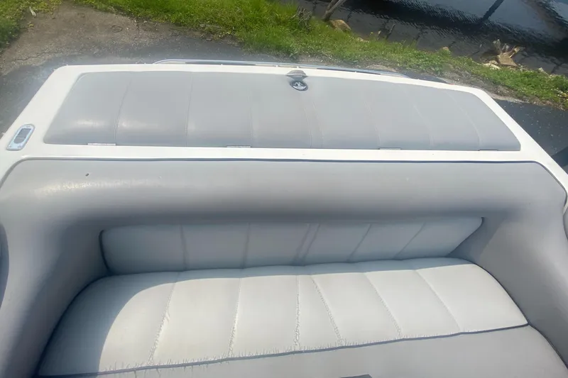 Slide: The Image of 2005 Calabria Cal-Air boat interior with gray and white seating. - 15