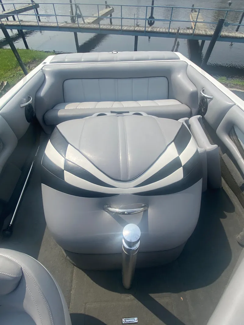 Slide: The Image of 2005 Calabria Cal-Air boat interior with gray and white seating. - 16