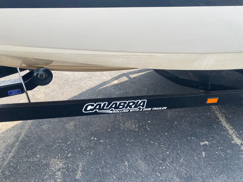 Slide: The Image of 2005 Calabria Cal-Air boat trailer with logo on pavement. - 5