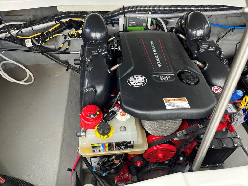 Slide: The Image of 2023 Crownline 270 SS SURF boat engine compartment with Volvo Penta 350 V8. - 14